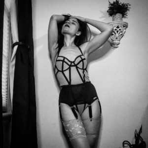 Dekilah wearing a bodysuit